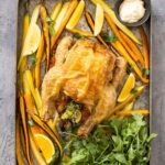 Geroosterde kip met citrusvruchten en wortels